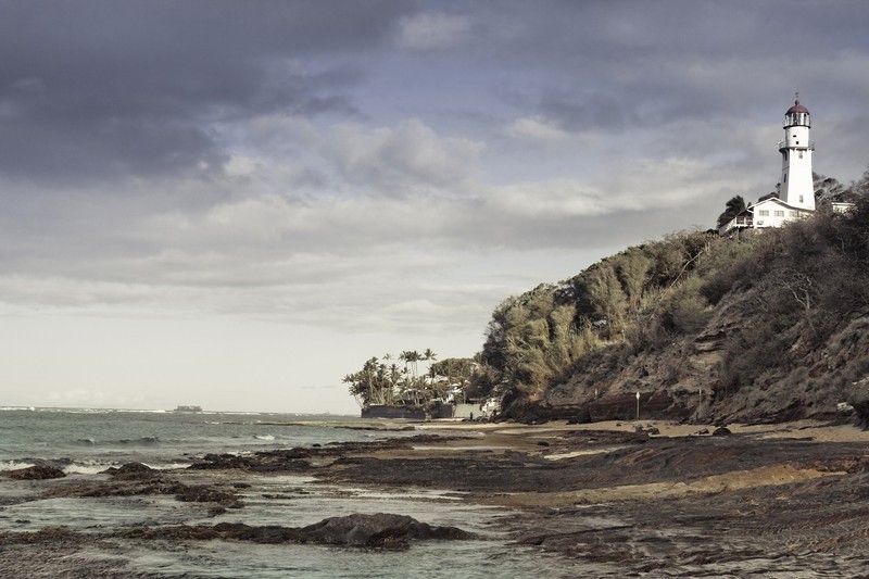 The Diamond Head Lighthouse sits atop a rather imposing cliff. Photo from Hawaii Photography Tours