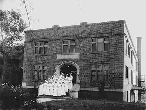 Nurses on the steps of the Ripley Memorial Hospital after it was completed in 1916 