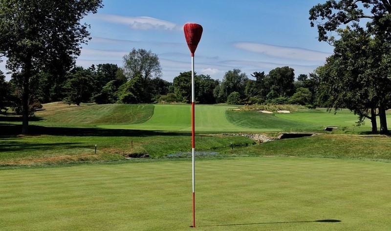 One of Merion's signature wicker basket pins, thought to have been inspired by shepherds in Scotland.  