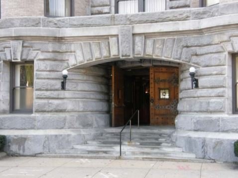 Entrance with original oak doors and light fixtures (image from the Massachusetts Historical Commission)