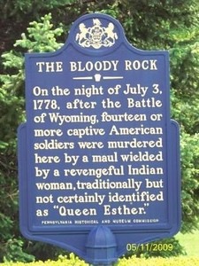 The marker says that "On the night of July 3, 1778, after the Battle of Wyoming, fourteen or more captive American soldiers were murdered here by a maul wielded by a revengeful Indian woman, traditionally but not certainly identified as Queen Esther.