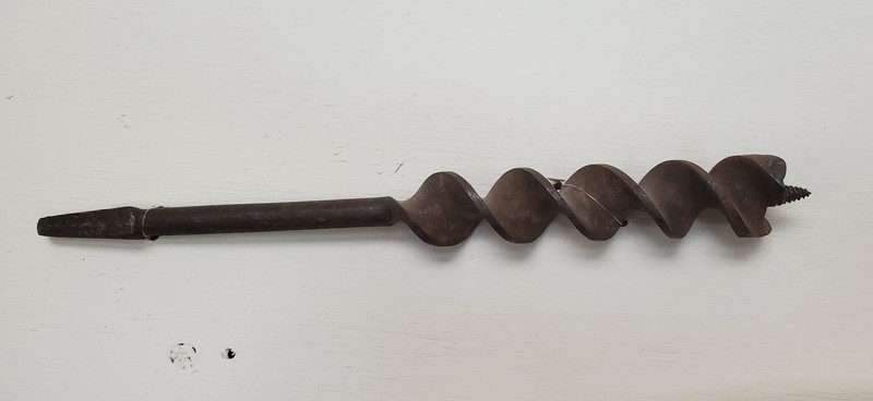 Auger Bit: Large, old-fashioned drill bit to be used with a brace or hand drill.