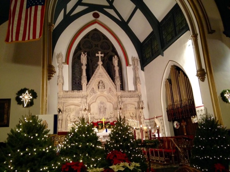 St. Mark's transept decorated for the holidays with the carved reredos in the background. 