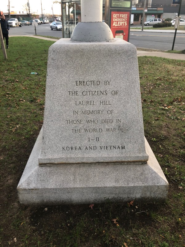 Inscription upon the granite base of the flagstaff