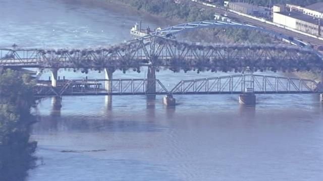 The former bridge was imploded demolished on October 9, 2013, about a year after the completion of the Amelia Earheart Memorial Bridge which is in the background. 