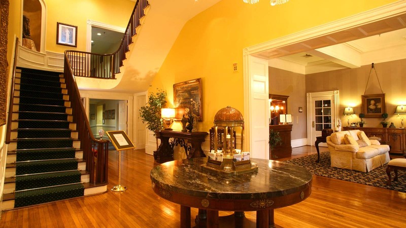 The Martha's main lobby and original parlor room of the Preston House