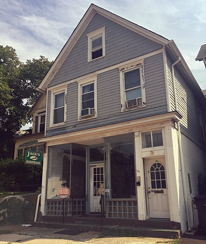 128 Raritan vacant storefront after Jack's Hardware closed.