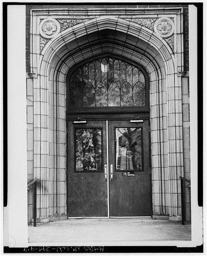 When Northcott Hall was demolished, the stone arch entrance was preserved and used in the design of the library as a window. 