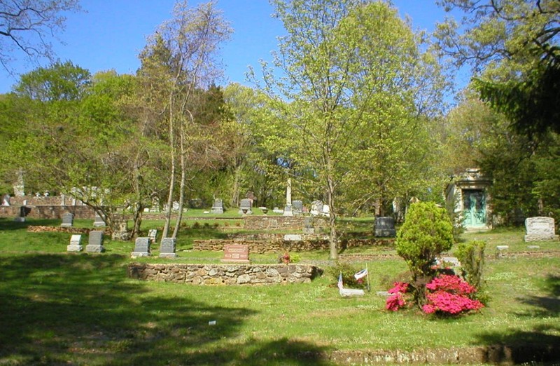 The small and well-landscaped cemetery.