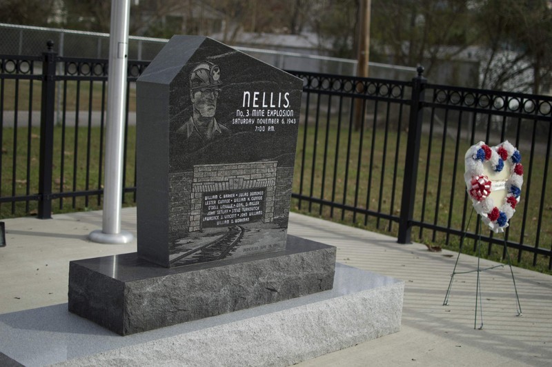 A picture of the fenced monument.