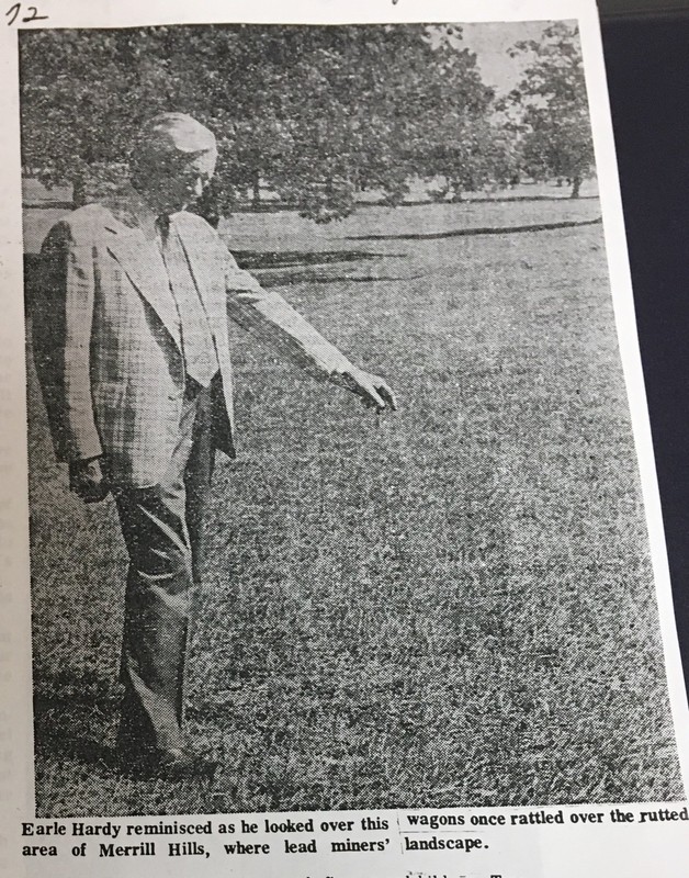 Earl is shown pointing to the spot where he investigated a cow that had been struck by lightning for insurance company at which he worked. He concluded that the land he was looking at was the perfect place on which to build a golf course.   