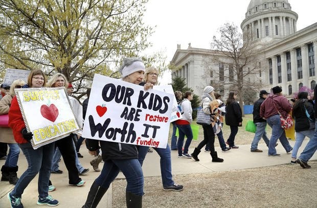 "Teachers from throughout the state converged at the Capitol to bring their concerns about education funding to the attention of legislators and state officials... on Monday, April 2, 2018." Photo by Jim Beckel, The Oklahoman.