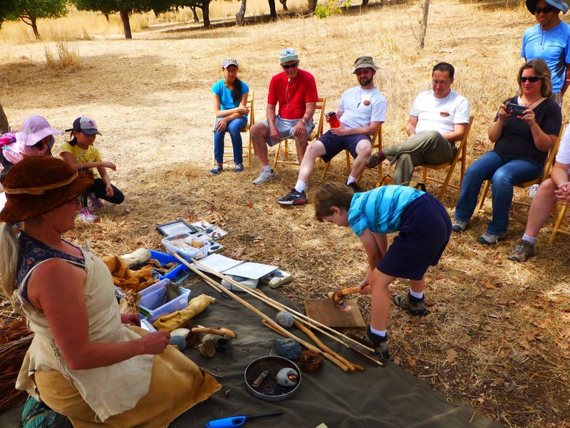 Visitors learn about Ohlone tools (Coyote Hills Facebook).