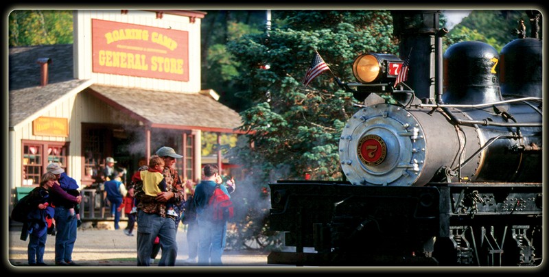 One of Roaring Camp's steam locomotives with the general store in background (RoaringCamp.com).