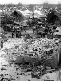 A different perspective of homes destroyed by the crash.