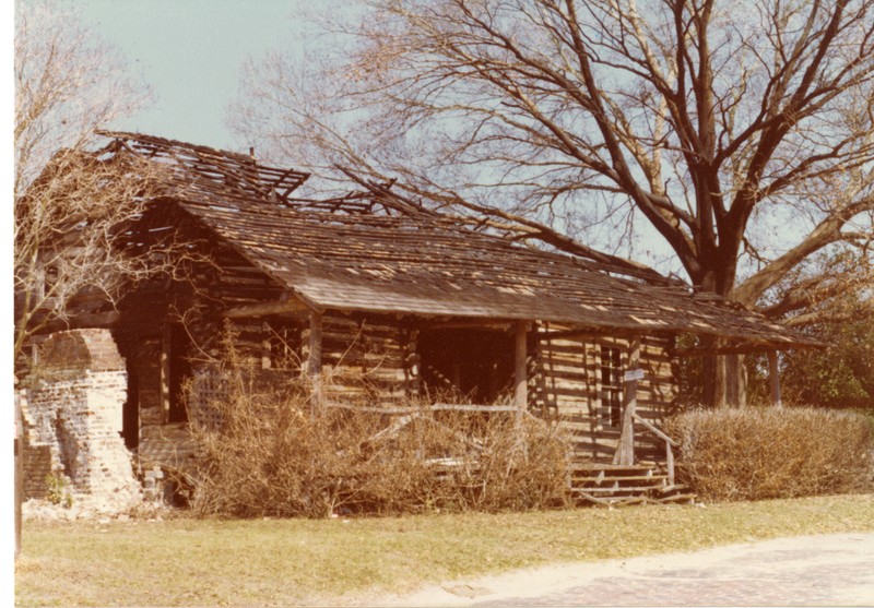 McMullen Coachman Log Cabin after damage from arson, Clearwater, Florida, 1976. 