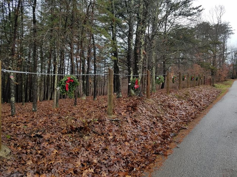 An image of the cemetery decorated with wreaths.