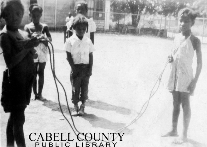 Children playing jump rope at the Barnett playground