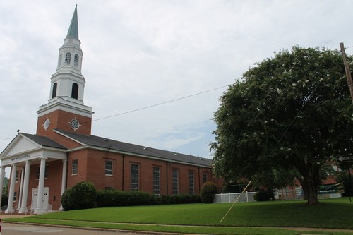 The main entrance, steeple, and sanctuary.