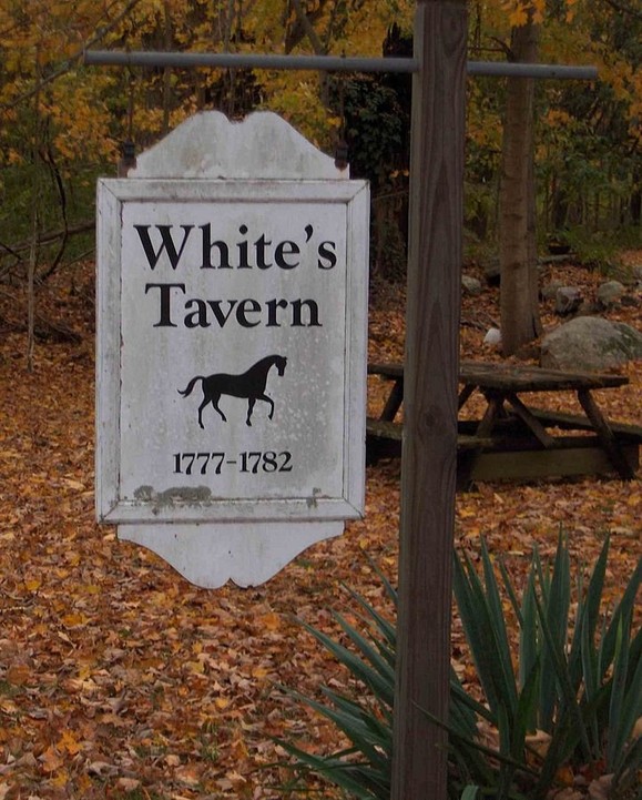 Sign for White's Tavern.