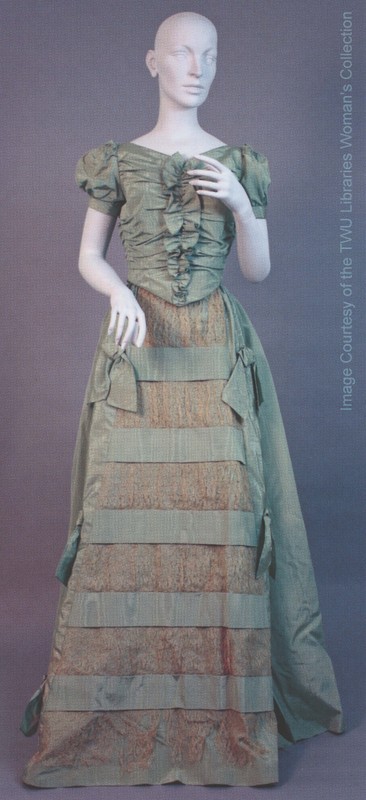 Mary Smith McCrory Jones gown (1844-46) presented to represent the fashion era of her time, and features a tight bodice, puffed sleeves, and full skirt. Photo courtesy of the Woman's Collection, TWU.