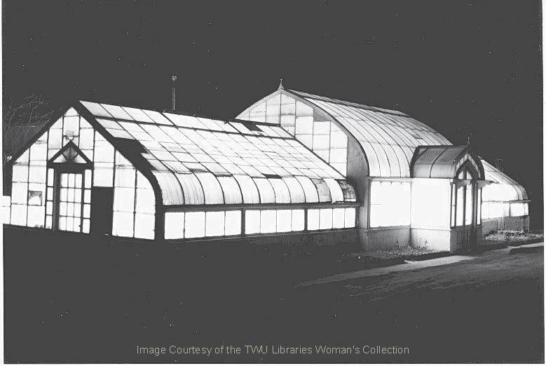 The Greenhouse at night. This photo was taken in following extensive renovations. (Photo: 2001, Courtesy of the TWU Woman's Collection)