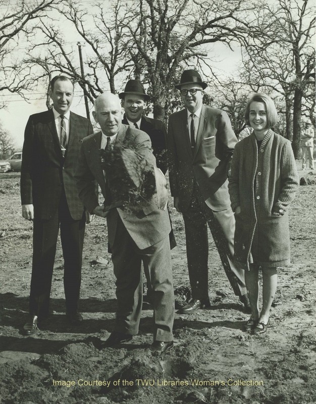 Stark Hall ground breaking ceremony (Jan. 4, 1966). Pictured: Dr. John Guinn, Dr. L.L. Armstrong of Denton First Baptist Church, Bill Drenner of Denton Chamber of Commerce, Mayor Warren Whitson, and TWU student, Paula Rich. Courtesy of TWU Libraries.