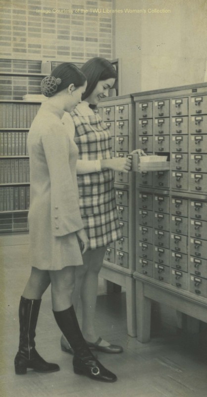 Students browse the card catalog at Bralley Memorial Library. TWU students spent hours sifting through hundreds of cards contained in special file cabinets like the one seen here. (Photo:1960s, Courtesy TWU Woman's Collection)