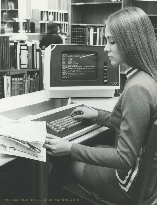 A TWU student studies at a computer terminal at Bralley Memorial Library. (Photo:1974, Courtesy TWU Woman's Collection)