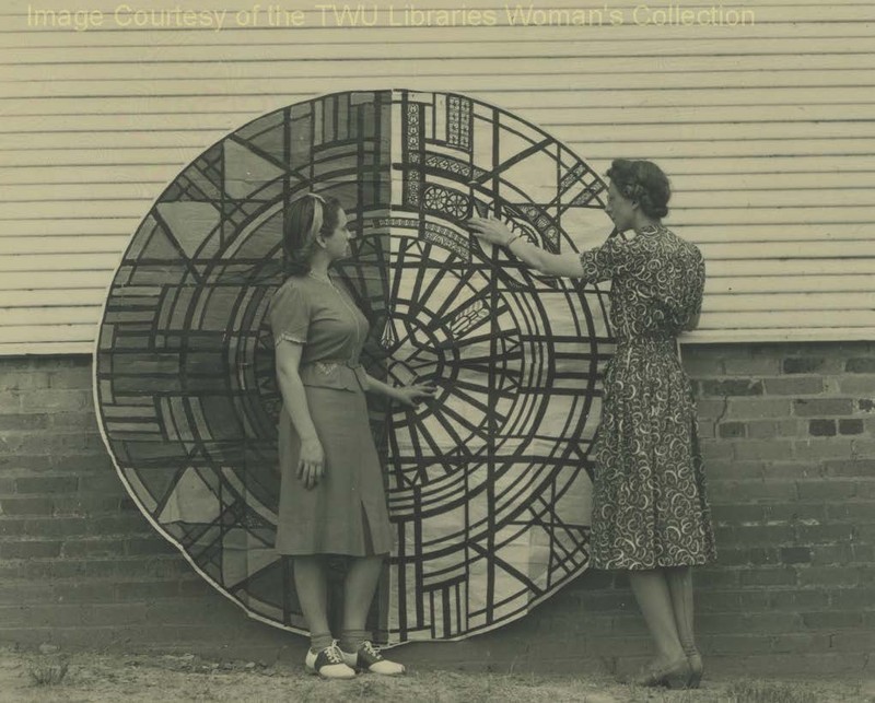 Dorothy "Toni" Laselle and Marilyn Yates in front of the Rose Window of the Little Chapel circa 1939. This window and the others were all fired, painted, and constructed on campus. (Courtesy of TWU Woman's Collection)