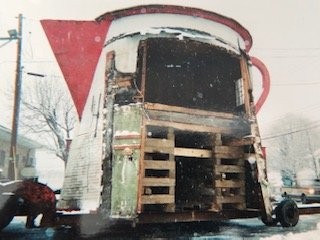 The Coffee Pot in a fragile state being relocated on a truck during a massive snowstorm. The task was seen as very difficult but the job got done.

(The Lincoln Highway Heritage Corridor Archives)