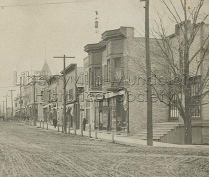 Hurlbutt Building, far right, Milwaukee Avenue looking north from Orchard (Church), 1905-1909