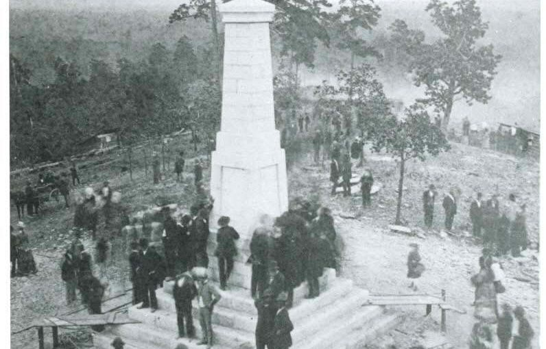 People gathered around Centennial Monument during Celebration