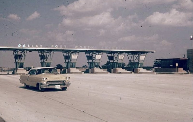 This is an older image of the Dallas-Fort Worth Turnpike, and a tollbooth. 