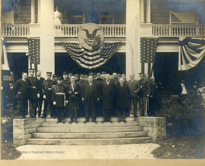 President Taft and guests gathered for the inauguration of West Virginia University president Thomas E. Hodges. Cox appears on the far left of the second row.