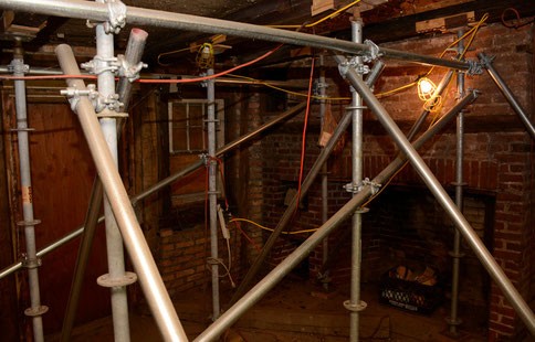 The metal reinforcements helping to stabilize the structure. This photograph was taken on the main level.