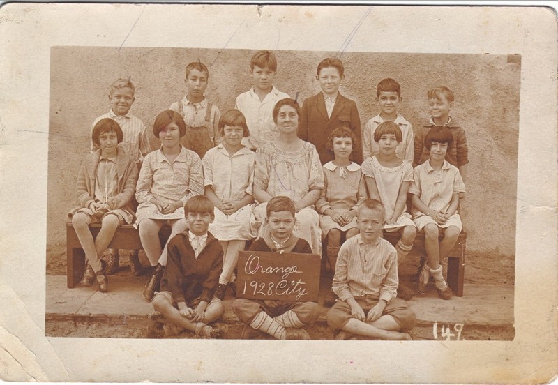 Mrs. Hodges class of 1928. Note the stucco wall of the new school house behind the children. Photo courtesy of Marsha Courtney.  