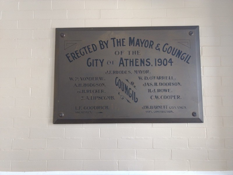 A plaque commemorating when construction on City Hall was completed