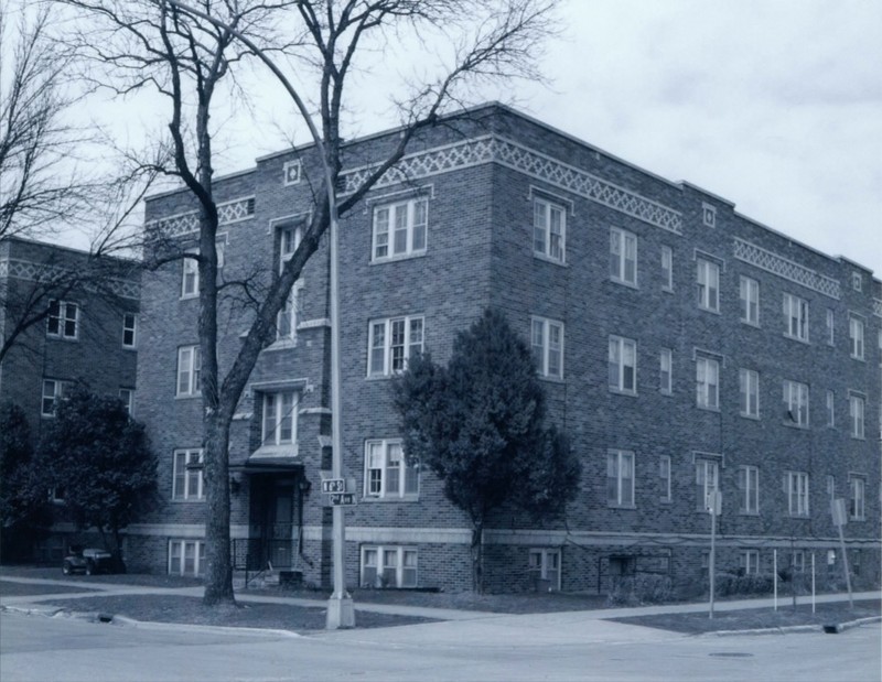 A Black and white photo of the right building of the apartment complex. 