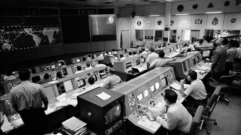 This is an image of an Apollo-era mission control room that used updated technology from the Gemini mission control room. One of the largest upgrades came in the form of screens in every console allowing the controllers to monitor spacecraft changes 