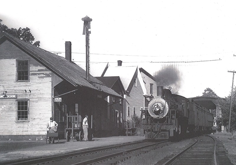 Photograph of Ken Smart (left) and Jim Dalby (right) at the Contoocook Depot, c. 1950.  