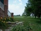 The land and acres of the home.