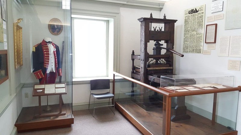 Artifacts on display within the museum, to include James Franklin's c. 1717 printing press.