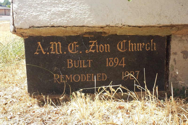 Bench outside of the original AME Zion Church in Redding.