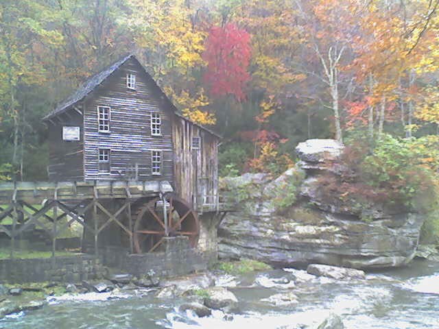 Picture of the mill from across the creek in the fall