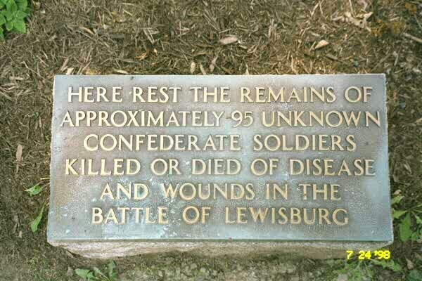 Marker at head of cross shaped mass grave