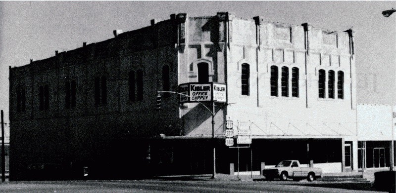 Front view of the Wright Opera House in 1982. The Kibbler Office Supply Store's sign visible on the front. During this time the opera house was vacant. 