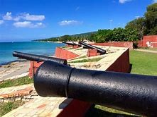 The fort includes replicas of cannon pointed towards the Caribbean Sea.