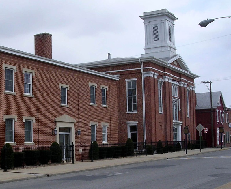 Side view of the First Lutheran Church, faced in red brick with symmetrical features in classic George style. Courtesy of Find-A-Grave.