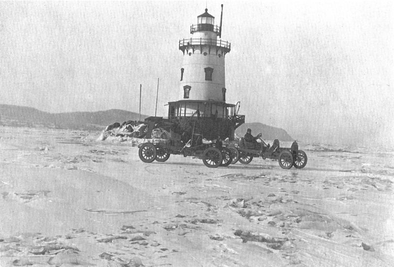 Lighthouse with Auto Racers on Frozen Hudson River (1912)